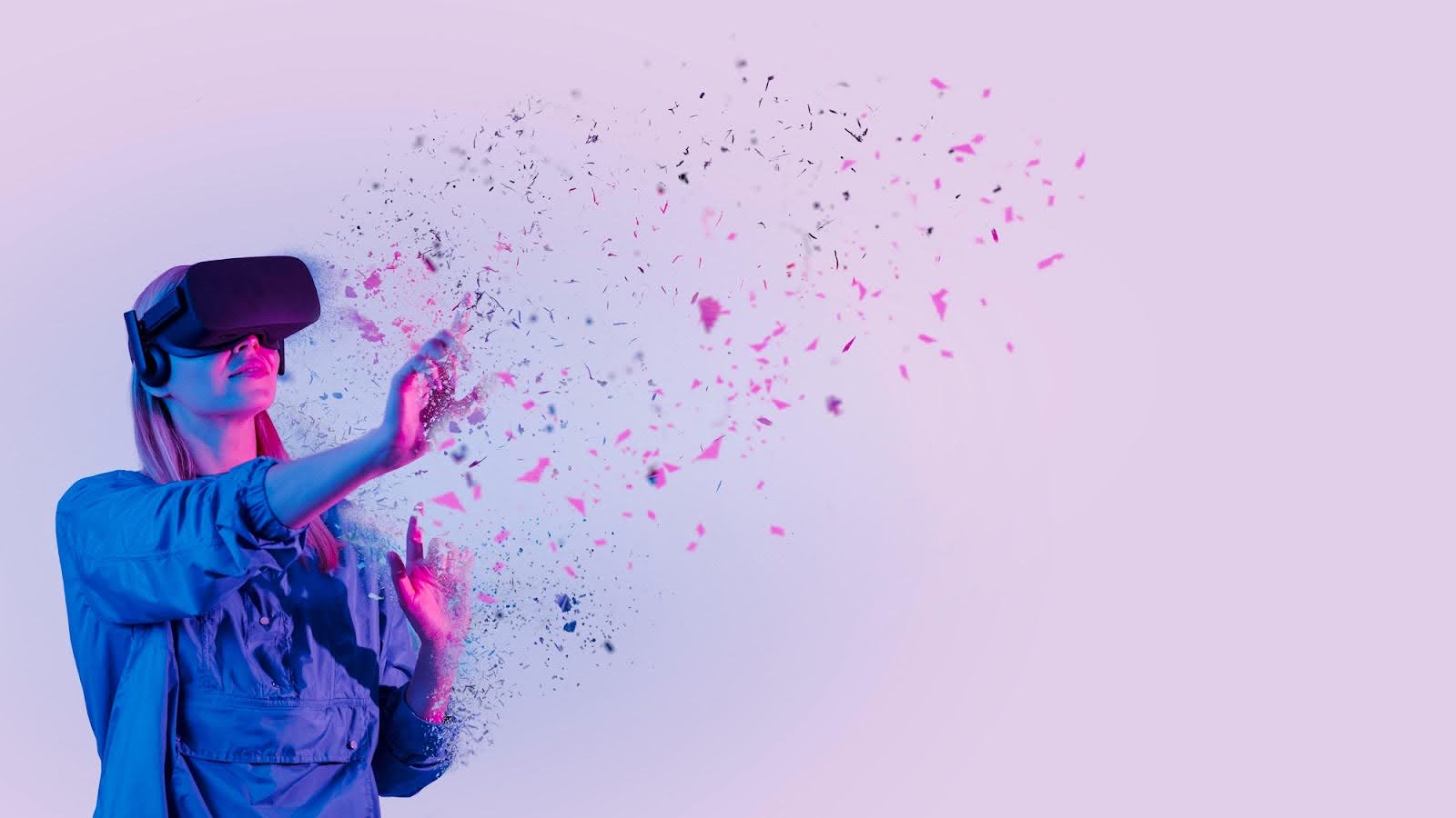 The picture shows a woman wearing a virtual reality headset.